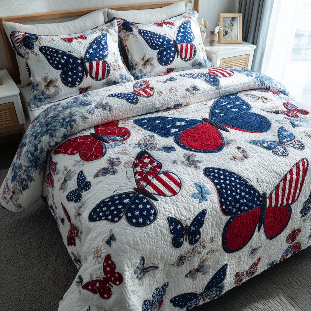 Velvet Wings quilted 3-piece bedding set on a made bed with two matching pillow shams