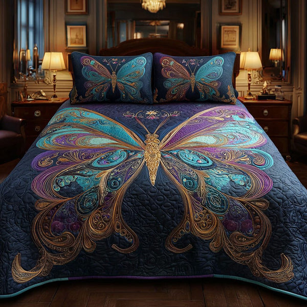 Velvet Wings quilted 3-piece bedding set on a made bed with two matching pillow shams