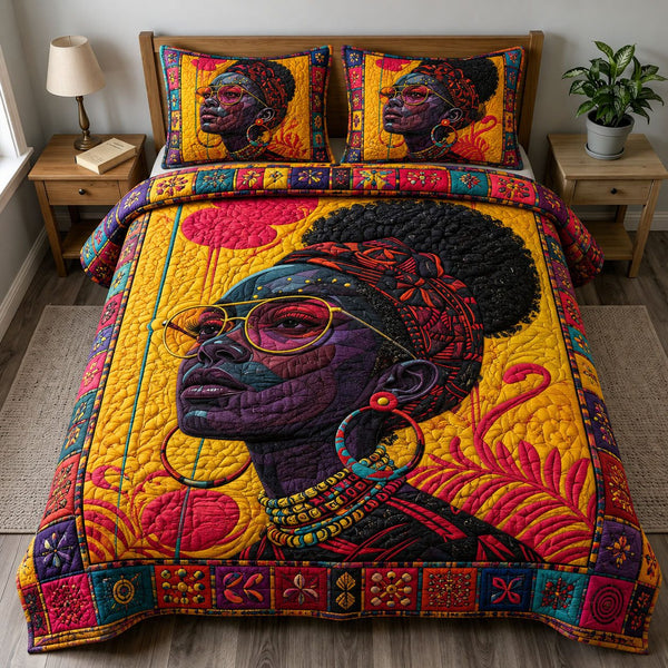 Vibrant Afro Queen quilted 3-piece bedding set on a made bed with two matching pillow shams