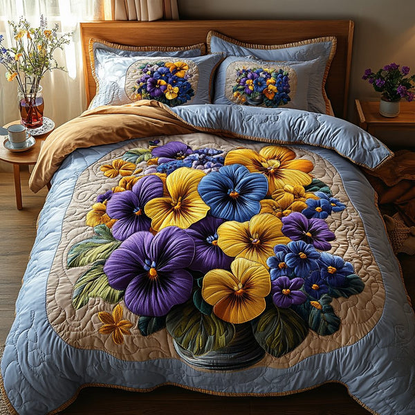 Vibrant Bloom quilted 3-piece bedding set on a made bed with two matching pillow shams