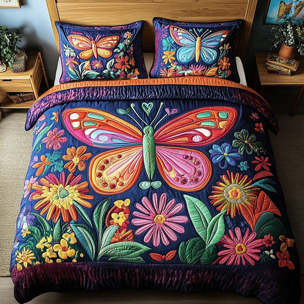 Vibrant Butterflies quilted 3-piece bedding set on a made bed with two matching pillow shams
