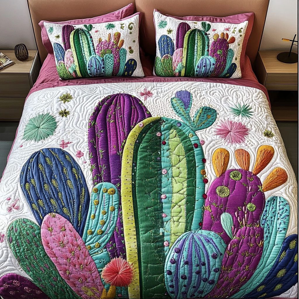 Vibrant Cactus Garden quilted 3-piece bedding set on a made bed with two matching pillow shams