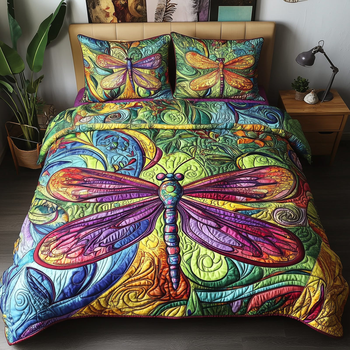 Vibrant Dragonfly quilted 3-piece bedding set on a made bed with two matching pillow shams