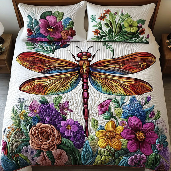 Vibrant Dragonfly quilted 3-piece bedding set on a made bed with two matching pillow shams