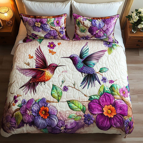 Vibrant Encounter quilted 3-piece bedding set on a made bed with two matching pillow shams