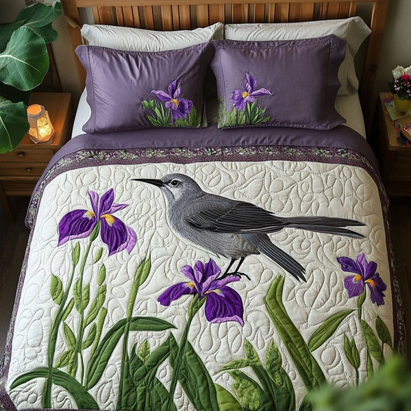 Vibrant Feathered View quilted 3-piece bedding set on a made bed with two matching pillow shams