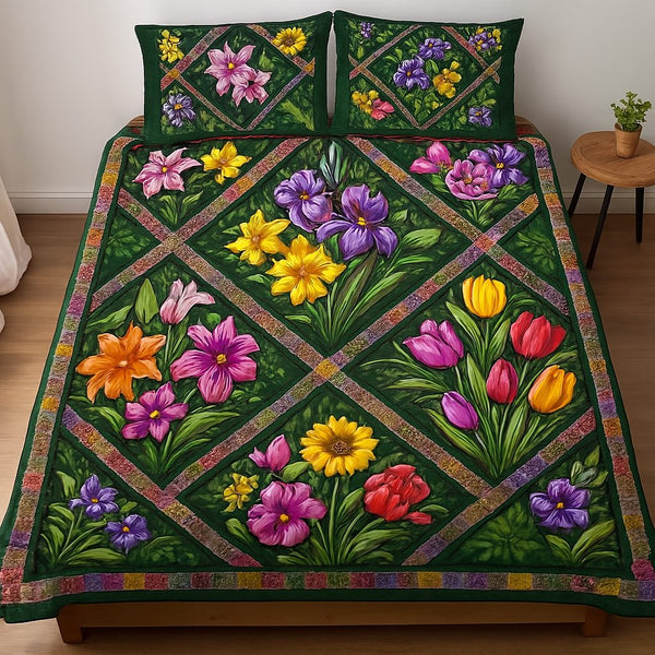 Vibrant Petals quilted 3-piece bedding set on a made bed with two matching pillow shams