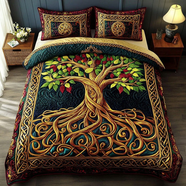Vibrant Roots quilted 3-piece bedding set on a made bed with two matching pillow shams