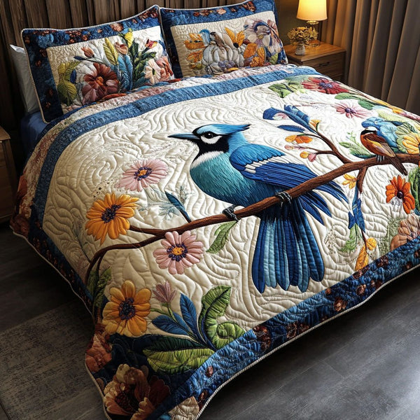 Vibrant Skies quilted 3-piece bedding set on a made bed with two matching pillow shams