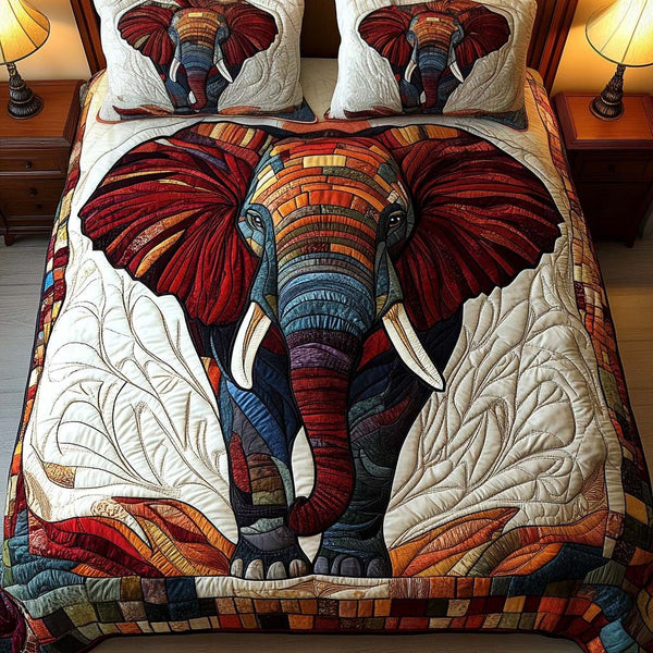 Vibrant Strength quilted 3-piece bedding set on a made bed with two matching pillow shams