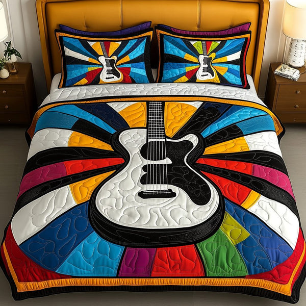 Vibrant Strings quilted 3-piece bedding set on a made bed with two matching pillow shams