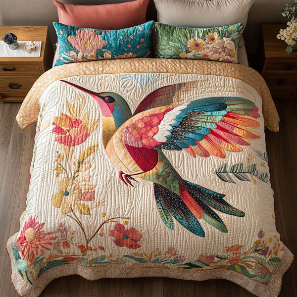 Vibrant Wings quilted 3-piece bedding set on a made bed with two matching pillow shams