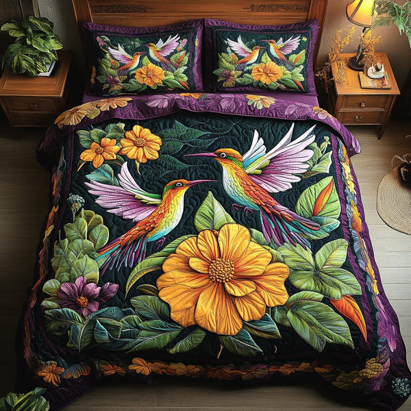 Vibrant Wings quilted 3-piece bedding set on a made bed with two matching pillow shams