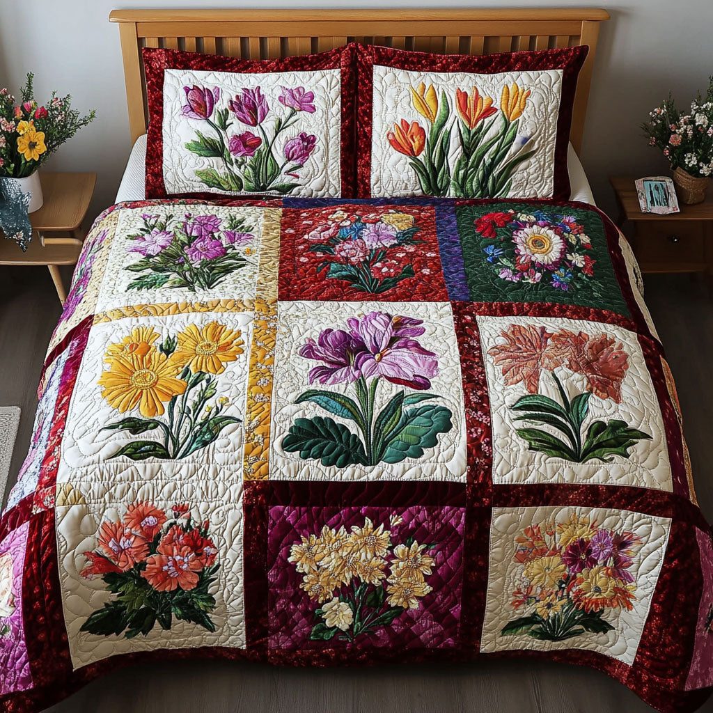 Victorian Bloom quilted 3-piece bedding set on a made bed with two matching pillow shams