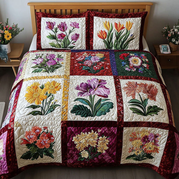 Victorian Bloom quilted 3-piece bedding set on a made bed with two matching pillow shams