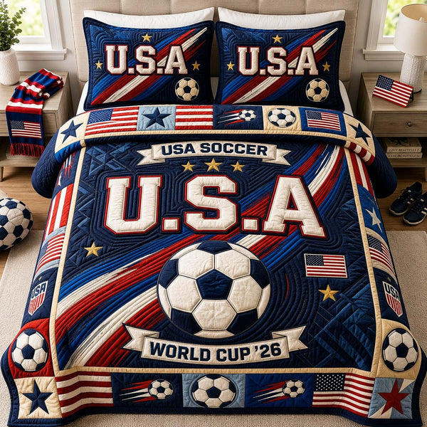 Victory Soccer Pride quilted 3-piece bedding set on a made bed with two matching pillow shams