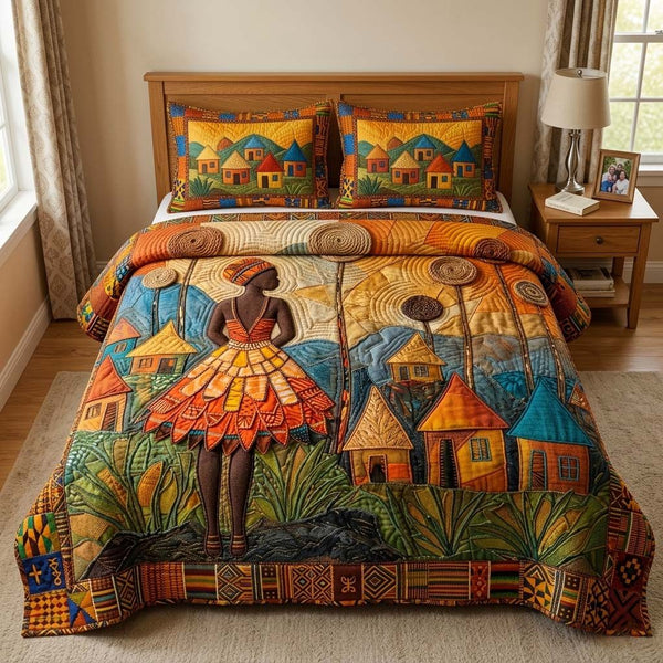 Village Dancer quilted 3-piece bedding set on a made bed with two matching pillow shams
