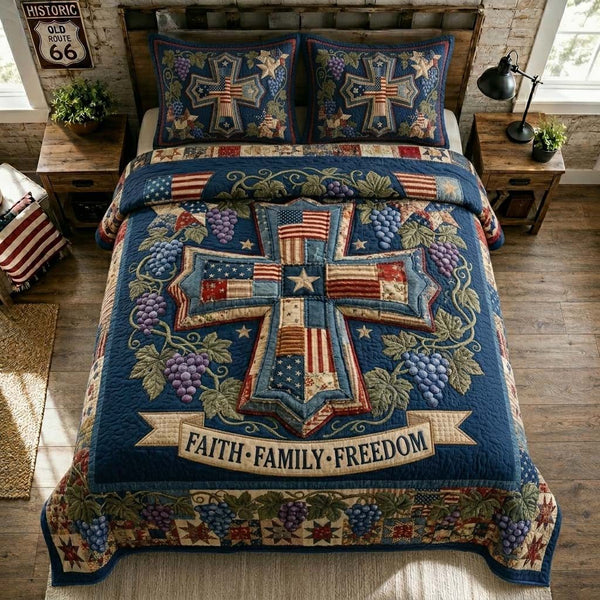 Vineyard Faith Cross quilted 3-piece bedding set on a made bed in a softly lit bedroom