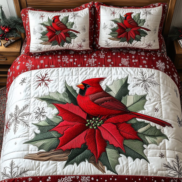 Vintage Cardinal Poinsettia Flower quilted 3-piece bedding set on a made bed in a winter-styled bedroom
