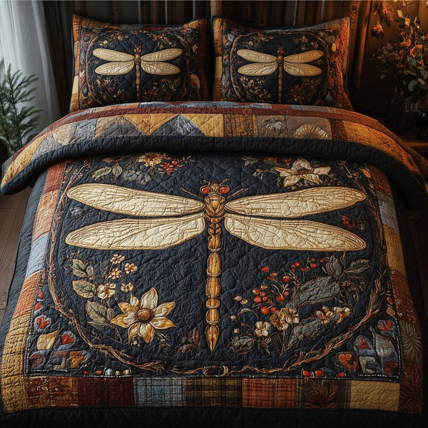 Vintage Dragonfly quilted 3-piece bedding set on a made bed in a farmhouse bedroom