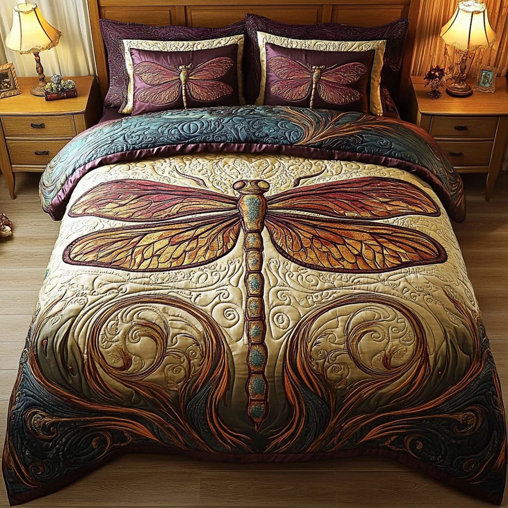 Vintage Dragonfly quilted 3-piece bedding set on a made bed in a farmhouse bedroom
