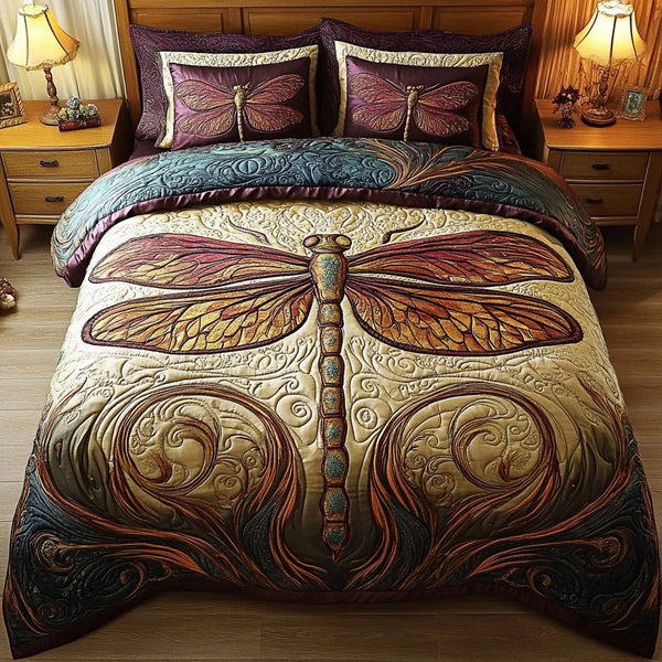 Vintage Dragonfly quilted 3-piece bedding set on a made bed in a farmhouse bedroom