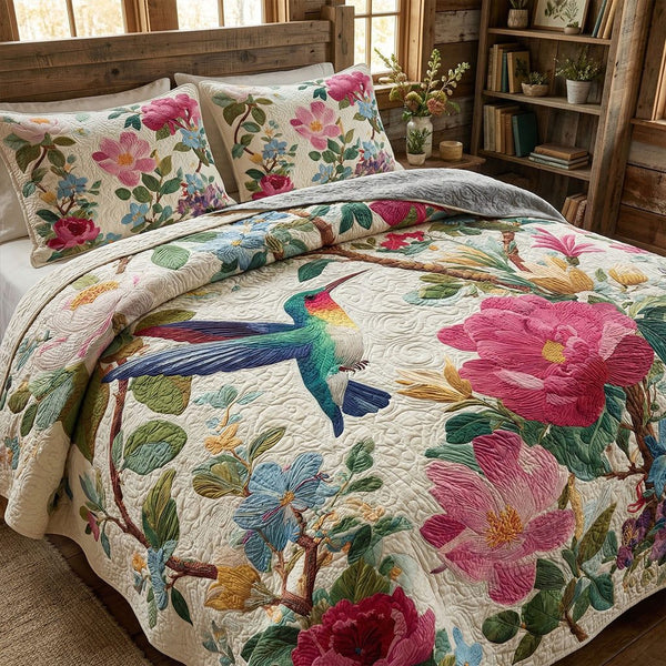 Vintage Garden Bloom quilted 3-piece bedding set on a made bed in a farmhouse bedroom