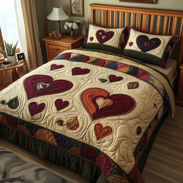 Vintage Heart quilted 3-piece bedding set on a made bed in a farmhouse bedroom