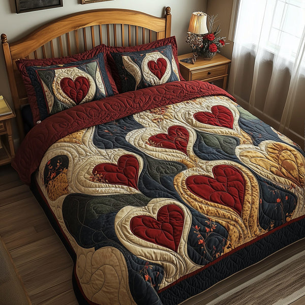Vintage Heart quilted 3-piece bedding set on a made bed in a farmhouse bedroom