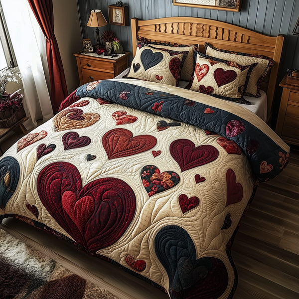 Vintage Heart quilted 3-piece bedding set on a made bed in a farmhouse bedroom