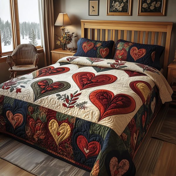 Vintage Heart quilted 3-piece bedding set on a made bed in a farmhouse bedroom