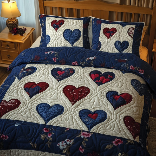 Vintage Love quilted 3-piece bedding set on a made bed in a farmhouse bedroom