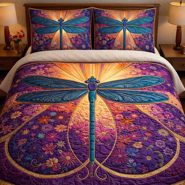 Violet Aura quilted 3-piece bedding set on a made bed with two matching pillow shams