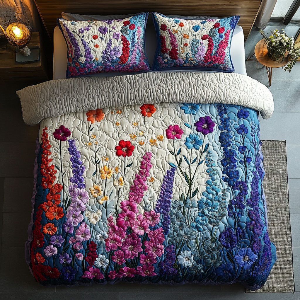 Violet Charm quilted 3-piece bedding set on a made bed with two matching pillow shams