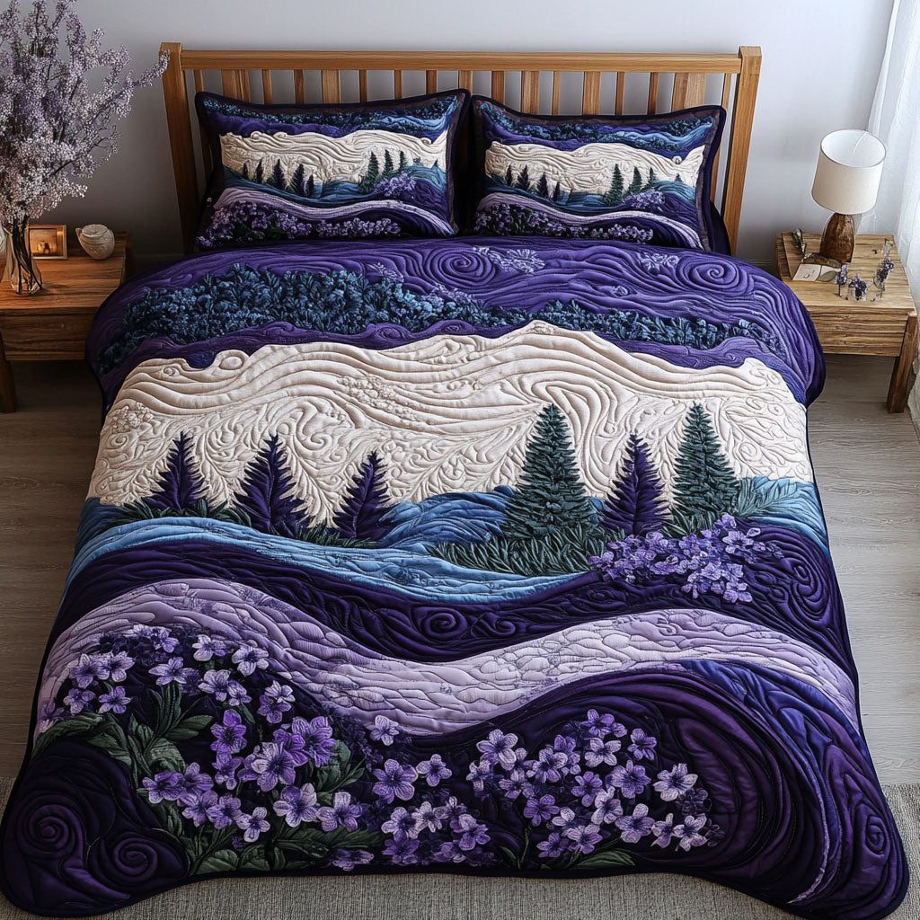 Violet Reflections quilted 3-piece bedding set on a made bed with two matching pillow shams