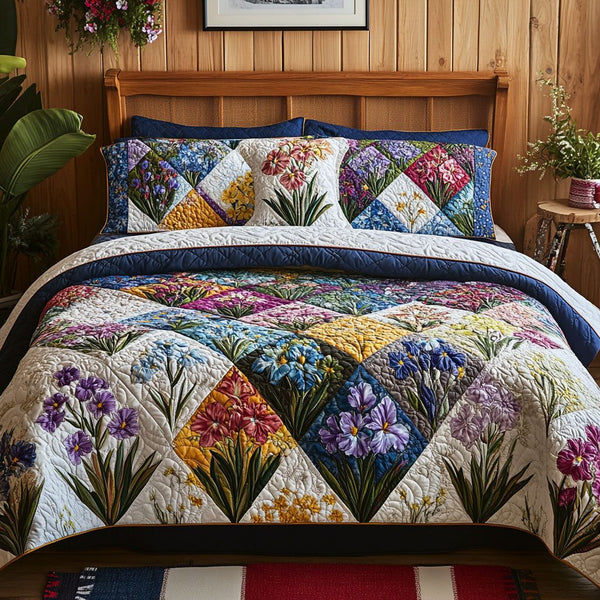 Violet Serenade quilted 3-piece bedding set on a made bed with two matching pillow shams