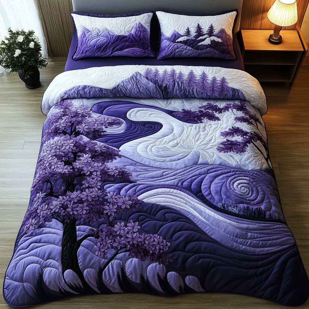 Violet Skies quilted 3-piece bedding set on a made bed with two matching pillow shams