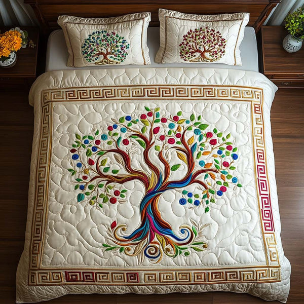 Vital Bloom quilted 3-piece bedding set on a made bed with two matching pillow shams