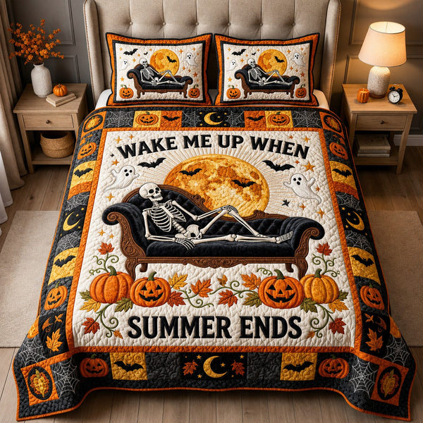 Wake Me Up When Summer Ends quilted 3-piece bedding set on a made bed with two matching pillow shams