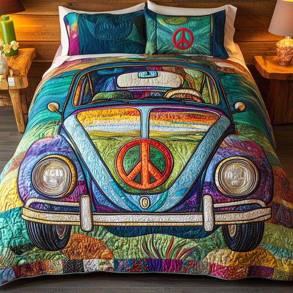 Wander Bug quilted 3-piece bedding set on a made bed with two matching pillow shams
