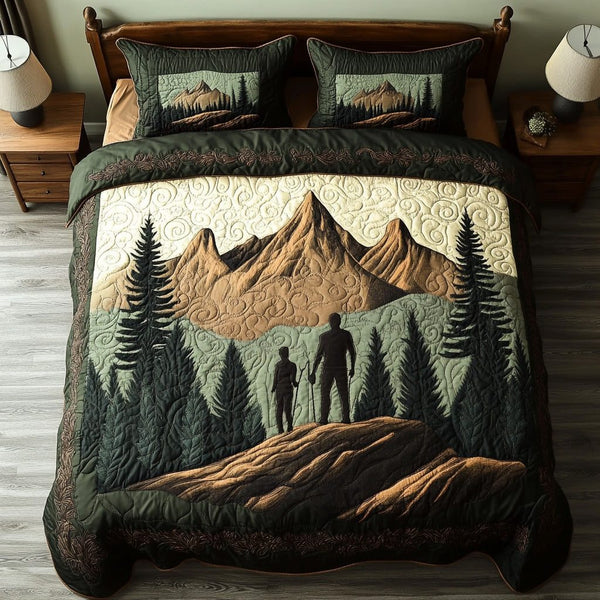 Wanderer Rest quilted 3-piece bedding set on a made bed with two matching pillow shams