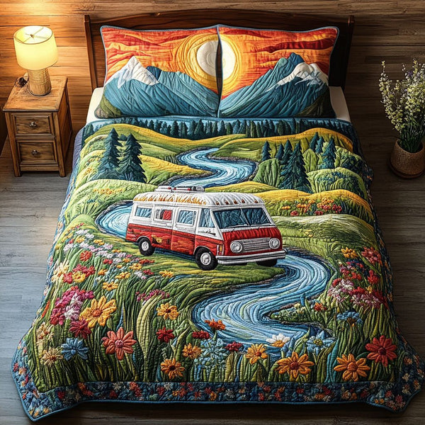 Wanderlust Vibes quilted 3-piece bedding set on a made bed with two matching pillow shams