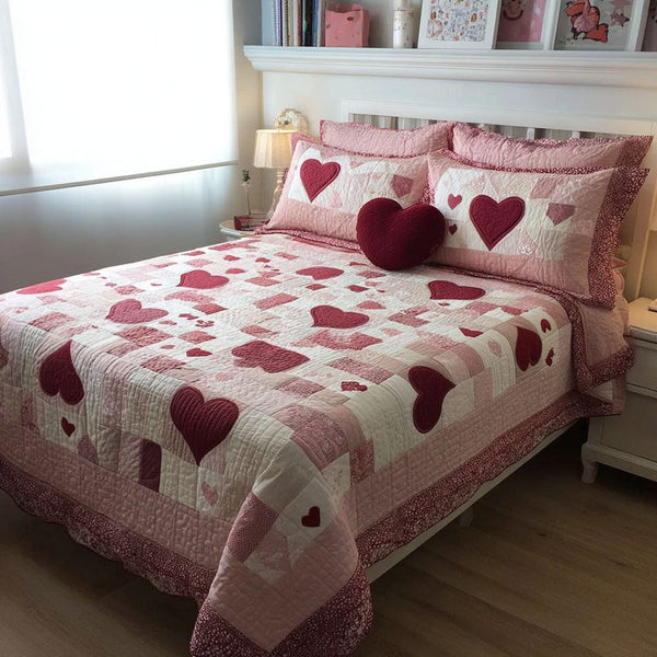 Warm Affection quilted 3-piece bedding set on a made bed with two matching pillow shams