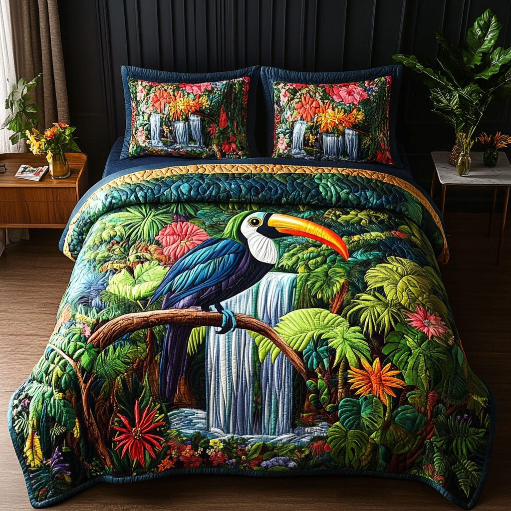 Waterfall Paradise quilted 3-piece bedding set on a made bed with two matching pillow shams