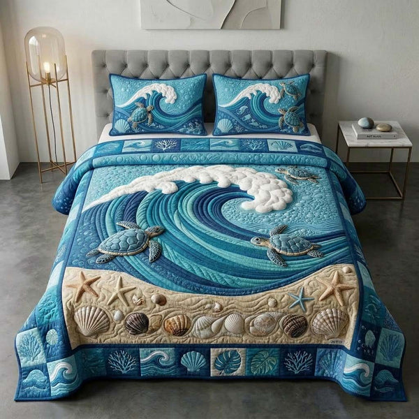 Wave Turtle quilted 3-piece bedding set on a made bed in a light coastal bedroom