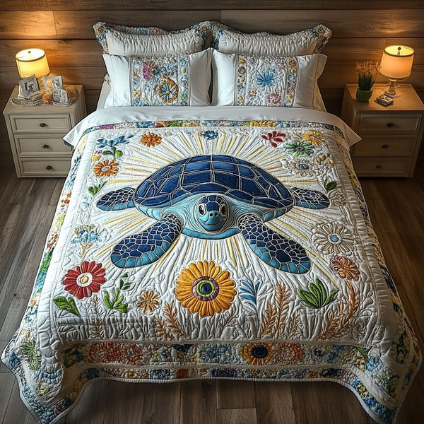 Wave Whisper quilted 3-piece bedding set on a made bed in a light coastal bedroom