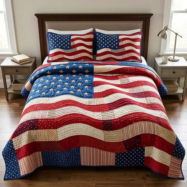 Waving Flag quilted 3-piece bedding set on a made bed in a warmly lit bedroom