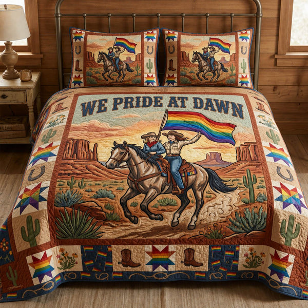 We Pride At Dawn quilted 3-piece bedding set on a made bed with two matching pillow shams