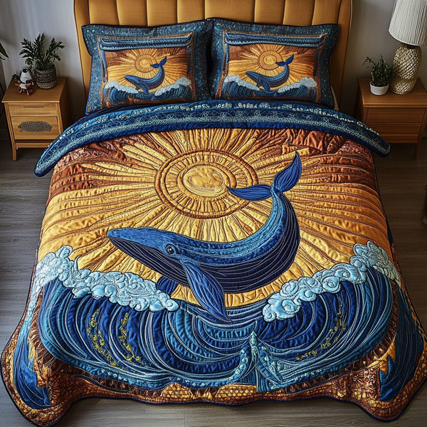 Whale Dream quilted 3-piece bedding set on a made bed in a light coastal bedroom