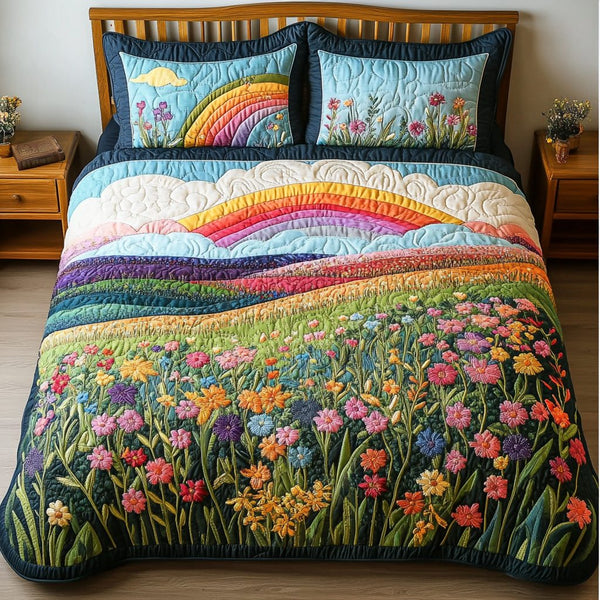 Whimsical Blooms quilted 3-piece bedding set on a made bed with two matching pillow shams